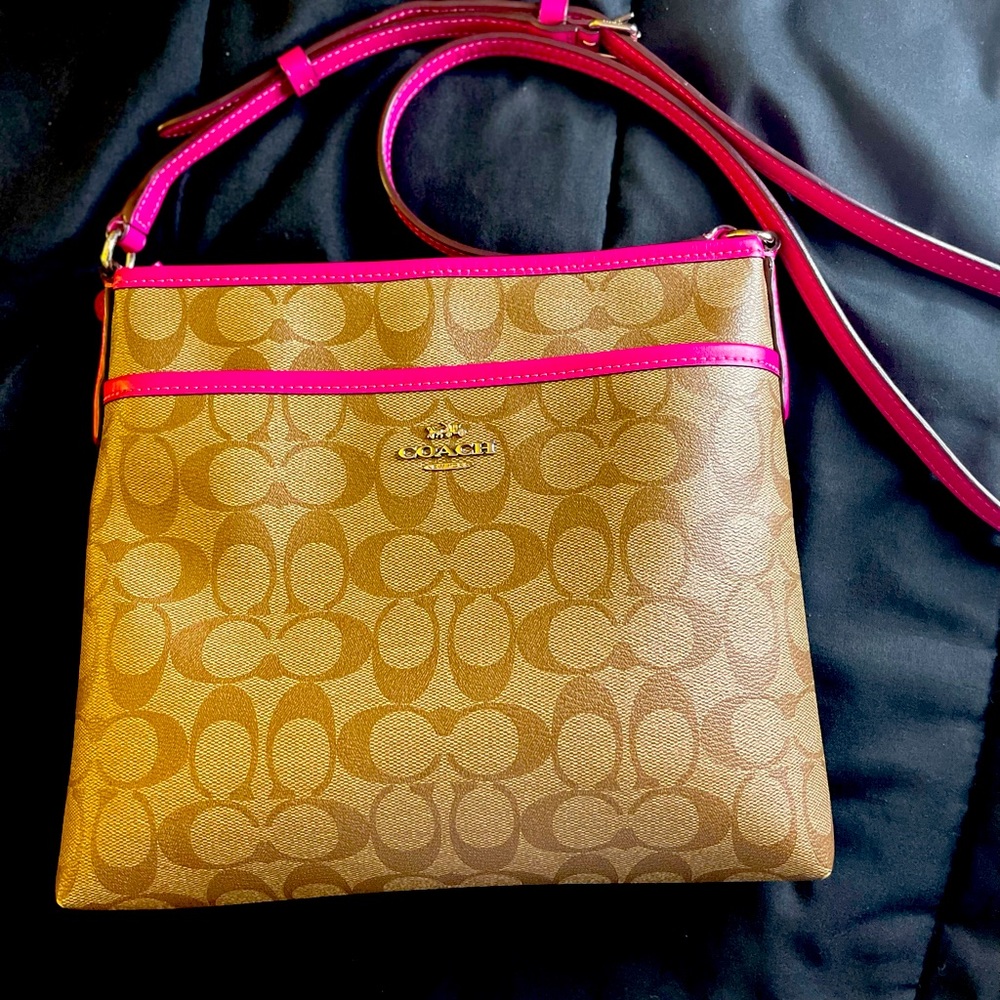 Coach purse with matching wristlet.